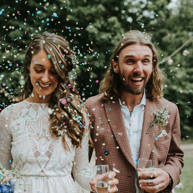 Confetti Moment | Bride in Grace Loves Lace | Groom in Brown Check Suit | Outdoor Woodland Wedding at The Dreys in Kent | Fern Edwards Photography