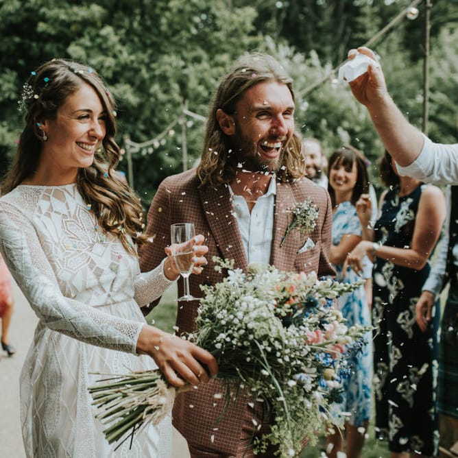 Confetti Moment | Bride in Grace Loves Lace | Groom in Brown Check Suit | Outdoor Woodland Wedding at The Dreys in Kent | Fern Edwards Photography