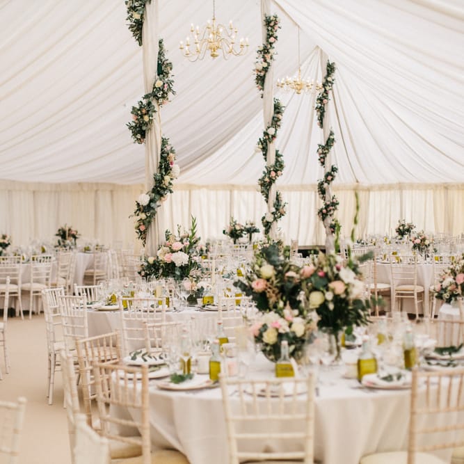 Marquee Poles With Floral Decor