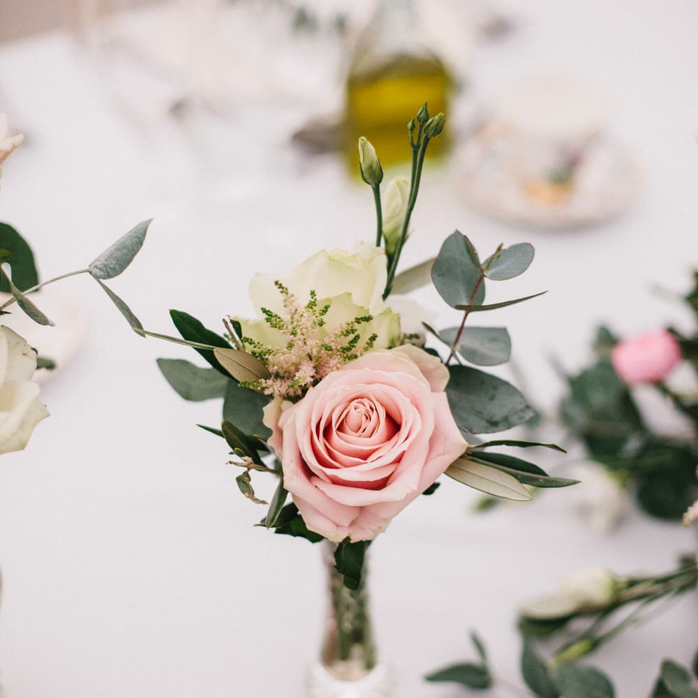 Roses In Bud Vases