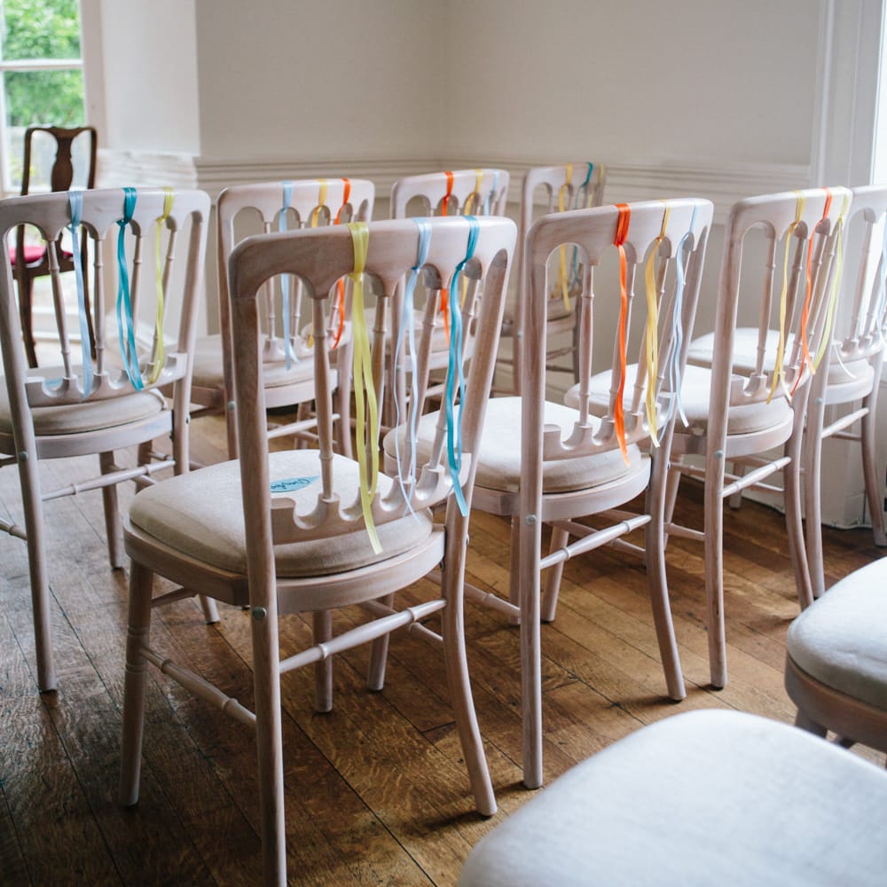 Ribbon Chair Backs | Colourful DIY Wedding at Barley Wood Country House in Somerset | A Thing Like That Photography