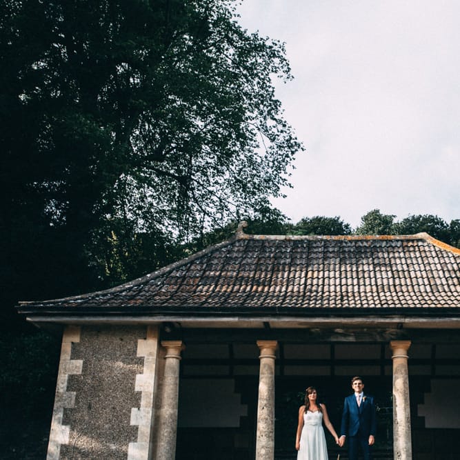 Bride in Bespoke Gown | Groom in Navy Blue Suit | Colourful DIY Wedding at Barley Wood Country House in Somerset | A Thing Like That Photography