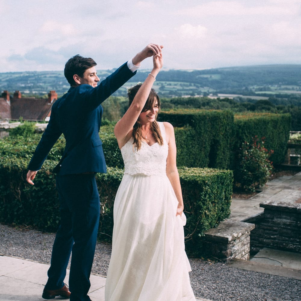 Bride in Bespoke Gown | Groom in Navy Blue Suit | Colourful DIY Wedding at Barley Wood Country House in Somerset | A Thing Like That Photography