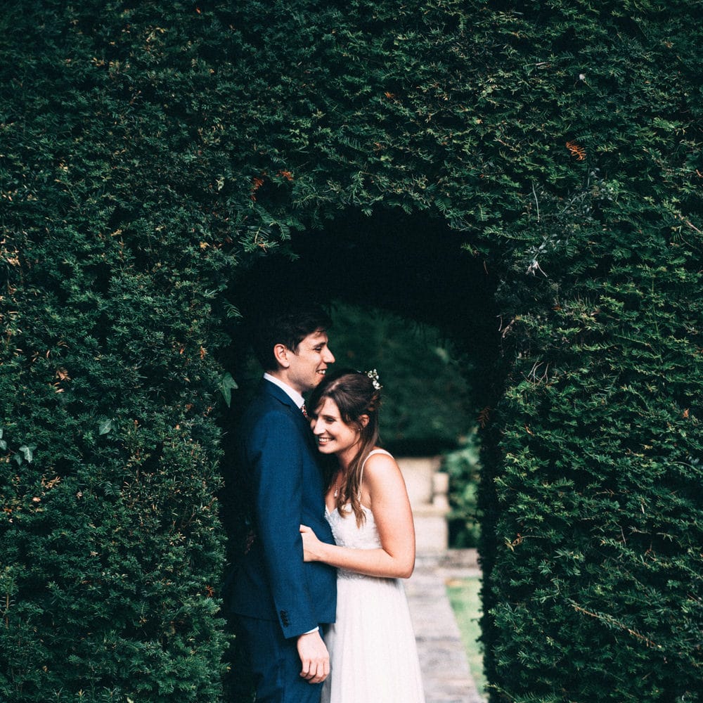 Bride in Bespoke Gown | Groom in Navy Blue Suit | Colourful DIY Wedding at Barley Wood Country House in Somerset | A Thing Like That Photography