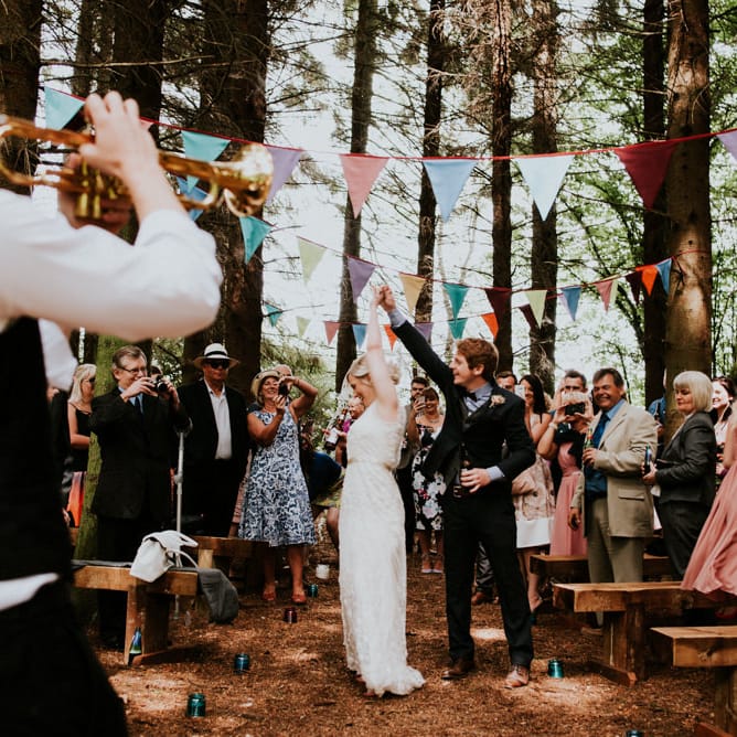Woodland Wedding Ceremony | Bride in Catherine Deane Gown | Groom in Ben Sherman Suit, Bow Tie & Gingham Shirt | Colourful Outdoor Wedding at Lineham Farm in Leeds | Shutter Go Click Photography