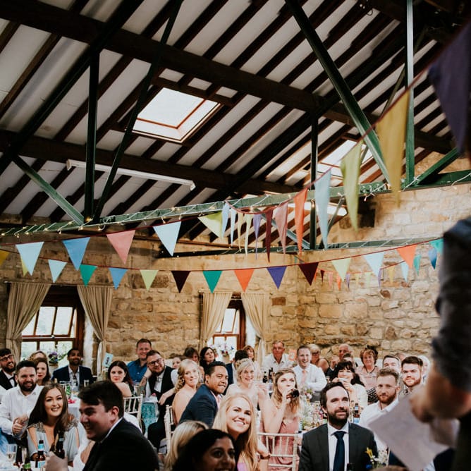 Speeches | Groom in Ben Sherman Suit, Bow Tie & Gingham Shirt | Colourful Barn Reception at Lineham Farm in Leeds | Shutter Go Click Photography