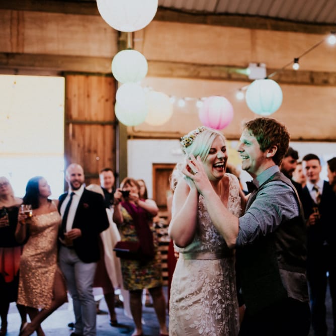 First Dance | Bride in Catherine Deane Gown | Groom in Ben Sherman Suit, Bow Tie & Gingham Shirt | Colourful Barn Reception at Lineham Farm in Leeds | Shutter Go Click Photography