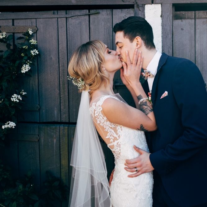 Bride in Lace Illusion Neck Wedding Dress | Groom in Next Suit | Dale Weeks Photography