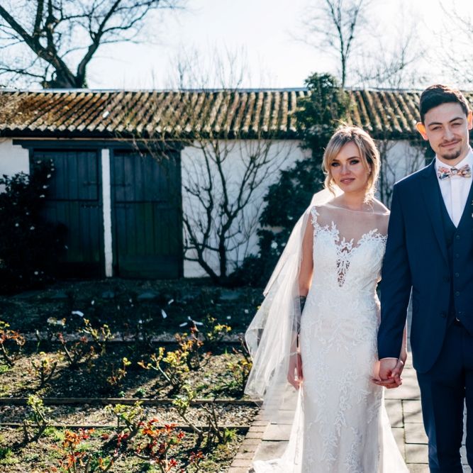 Bride in Lace Illusion Neck Wedding Dress | Groom in Next Suit | Dale Weeks Photography