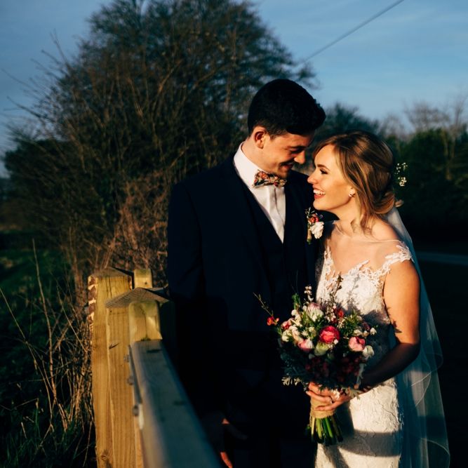 Bride in Lace Illusion Neck Wedding Dress | Groom in Next Suit | Dale Weeks Photography