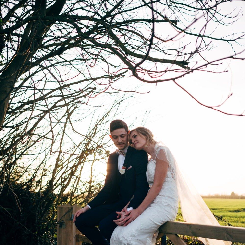 Bride in Lace Illusion Neck Wedding Dress | Groom in Next Suit | Dale Weeks Photography