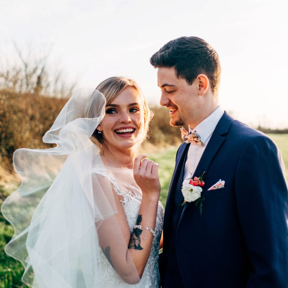 Bride in Lace Illusion Neck Wedding Dress | Groom in Next Suit | Dale Weeks Photography