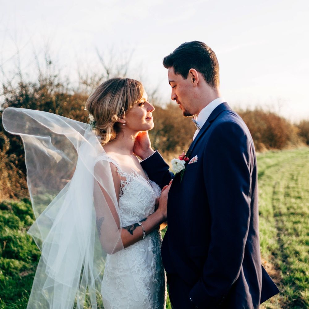 Bride in Lace Illusion Neck Wedding Dress | Groom in Next Suit | Dale Weeks Photography