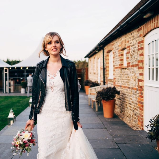 Bride in Lace Illusion Neck Wedding Dress & Leather Jacket | Dale Weeks Photography