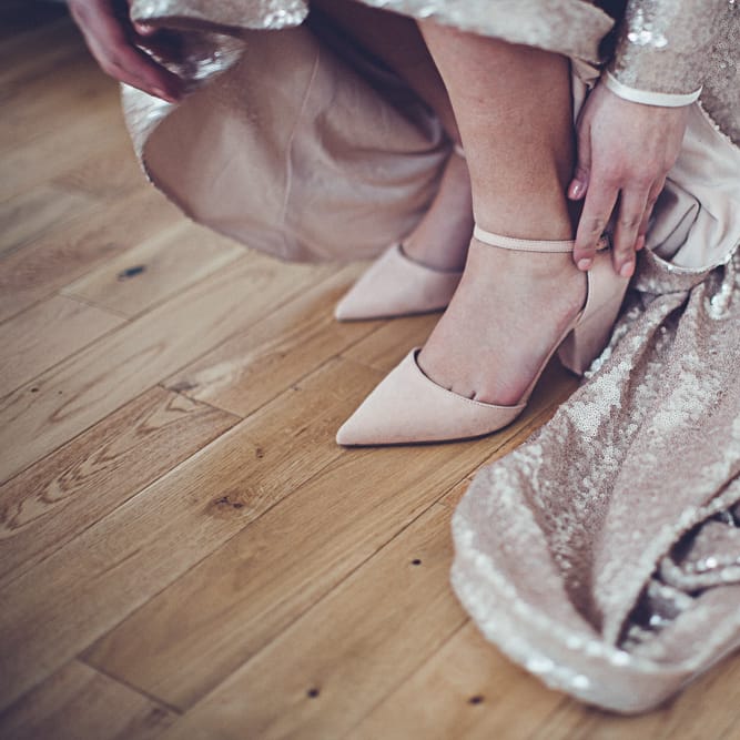 Bride In Gold Sequinned Dress For A Relaxed Wedding At Asylum Chapel With Bridesmaids In Mismatched High Street Dresses And Images by Lovestruck Photography
