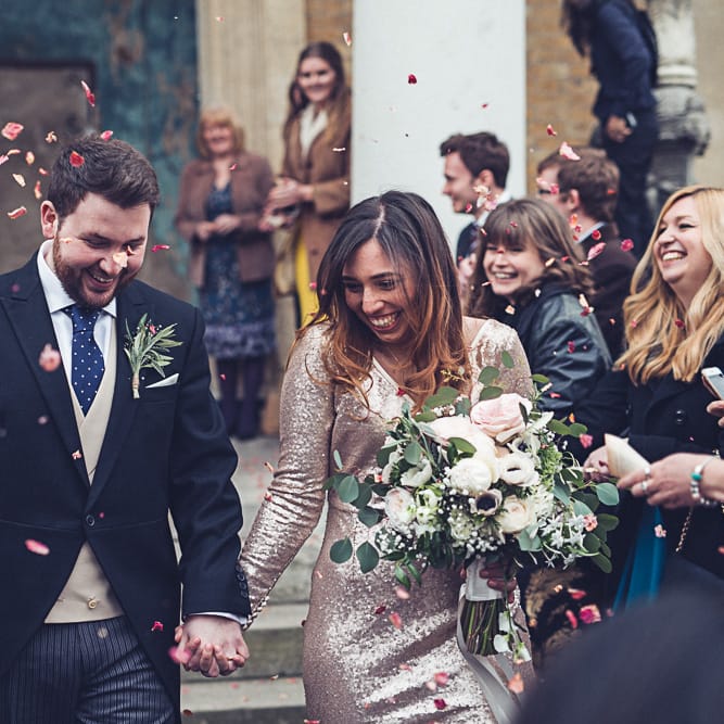 Bride In Gold Sequinned Dress For A Relaxed Wedding At Asylum Chapel With Bridesmaids In Mismatched High Street Dresses And Images by Lovestruck Photography