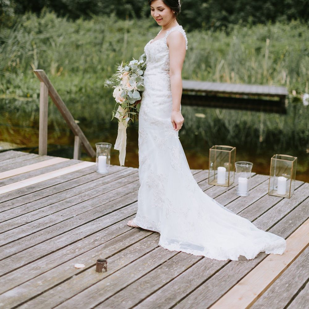 Bride in Brautmode Stern Wedding Dress