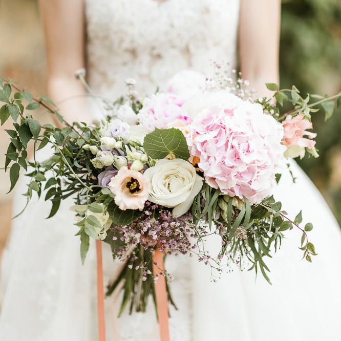 Close up of pink wedding bouquet