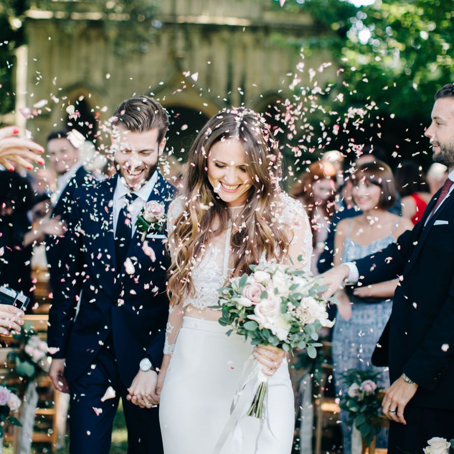 Confetti shot as couple exit ceremony 