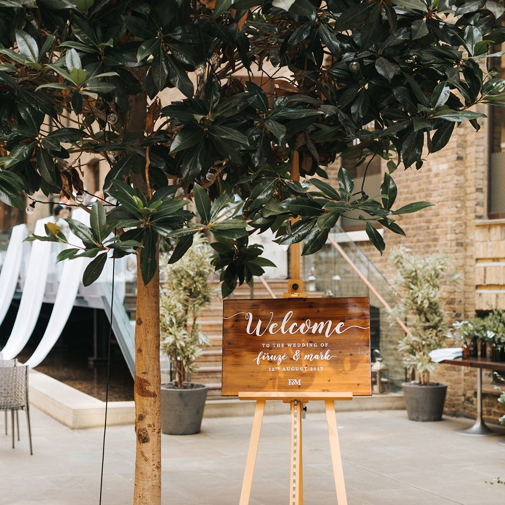 Devonshire Terrace For A Stylish Green &amp; White Wedding With Lots Of Foliage And Elegant Signage With Bride In Bespoke Pronovias And Images From Miss Gen