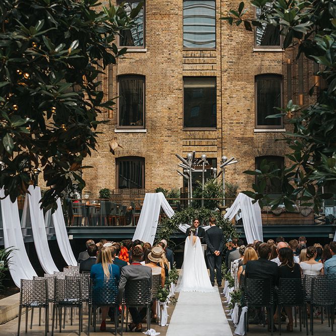 Devonshire Terrace For A Stylish Green &amp; White Wedding With Lots Of Foliage And Elegant Signage With Bride In Bespoke Pronovias And Images From Miss Gen