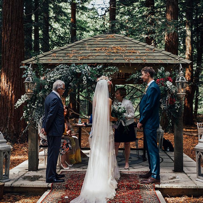 Wedding Ceremony | Bride in Bespoke Lace Gown & Flower Grown | Groom in Blue Suit | DIY Woodland Wedding at Two Woods Estate in Sussex | PJ Phillips Photography