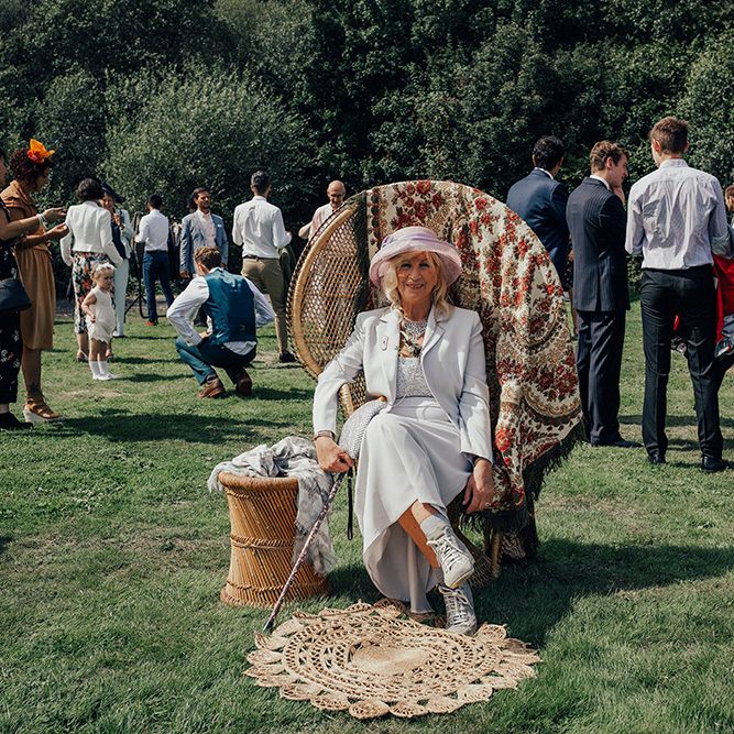 Wedding Guests in Peacock Chair | DIY Woodland Wedding at Two Woods Estate in Sussex | PJ Phillips Photography