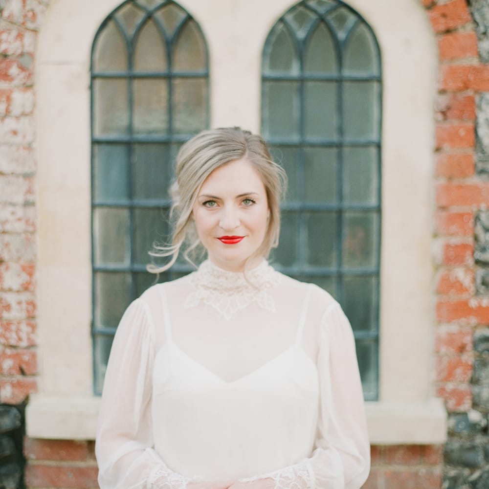 Beautiful Bride With Bright Red Lip And Soft Up Do