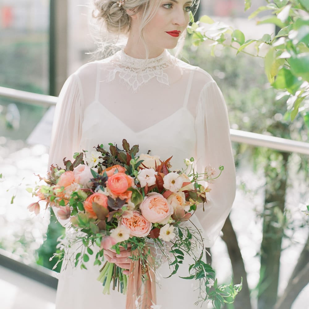 Beautiful Bride With Bright Red Lip And Soft Up Do