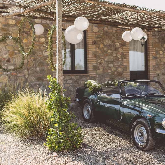 Vintage Wedding Car For Destination Wedding // Rustic Luxe Wedding In Tuscany Styled By The Wedding Of My Dreams With Flowers By Passion For Flowers Anna Campbell Bride Images & Film From WE ARE // THE CLARKES