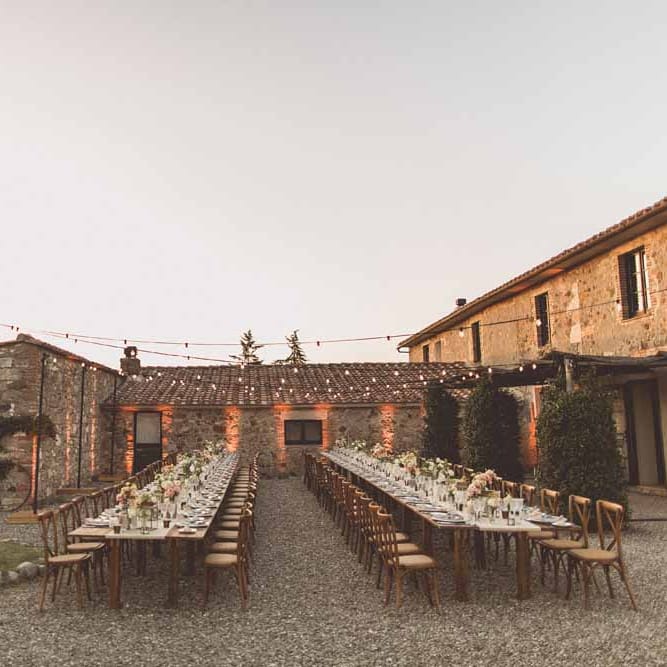 Outdoor Dining At Italian Wedding // Bridesmaids In Grey Dresses By Jenny Yoo // Rustic Luxe Wedding In Tuscany Styled By The Wedding Of My Dreams With Flowers By Passion For Flowers Anna Campbell Bride Images & Film From WE ARE // THE CLARKES