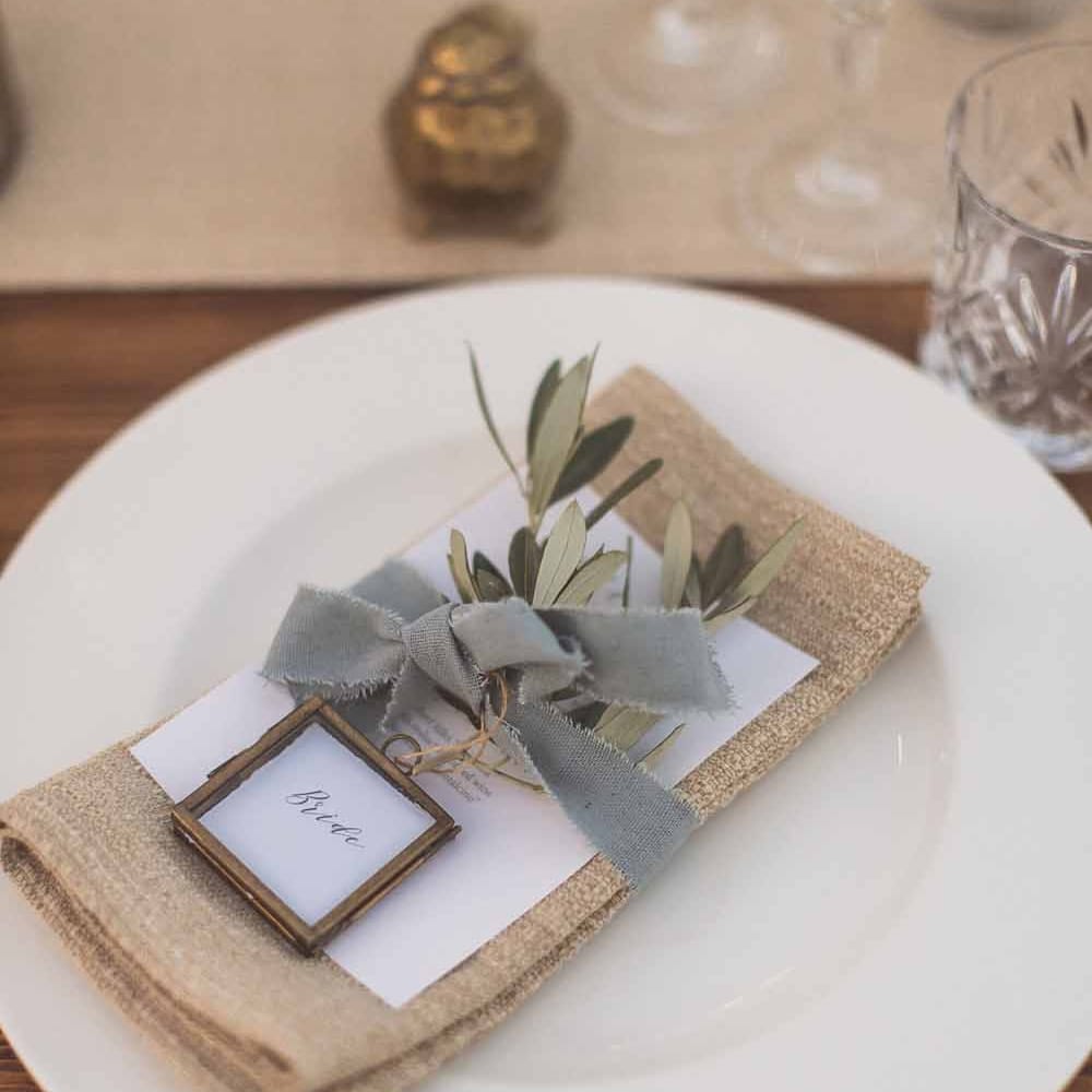 Simple Place Setting With Hessian And Herbs // Outdoor Dining At Italian Wedding // Bridesmaids In Grey Dresses By Jenny Yoo // Rustic Luxe Wedding In Tuscany Styled By The Wedding Of My Dreams With Flowers By Passion For Flowers Anna Campbell Bride Images & Film From WE ARE // THE CLARKES