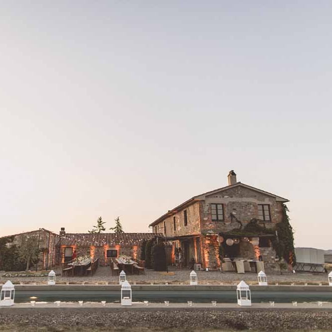 Outdoor Dining At Italian Wedding // Bridesmaids In Grey Dresses By Jenny Yoo // Rustic Luxe Wedding In Tuscany Styled By The Wedding Of My Dreams With Flowers By Passion For Flowers Anna Campbell Bride Images & Film From WE ARE // THE CLARKES