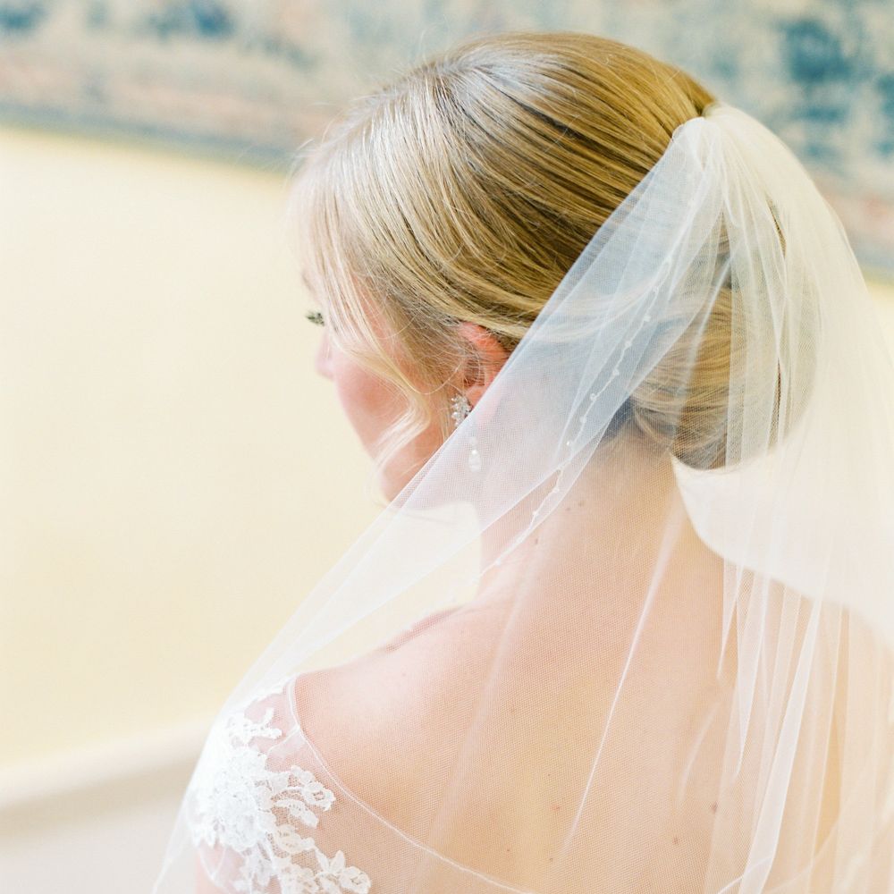Bride in Naomi Neoh Wedding Dress