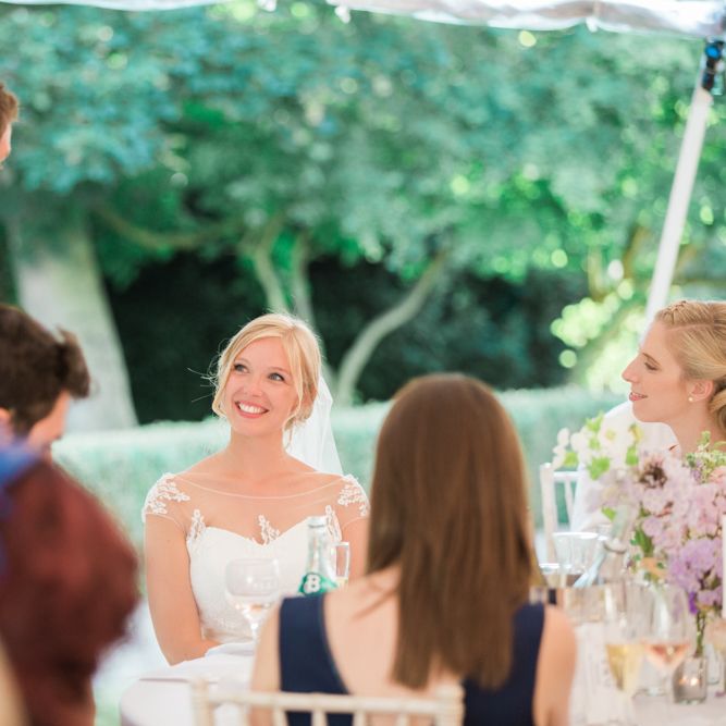 Bride in Naomi Neoh Wedding Dress