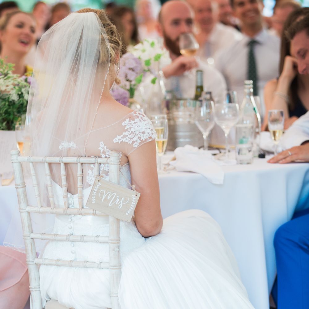 Bride in Naomi Neoh Wedding Dress
