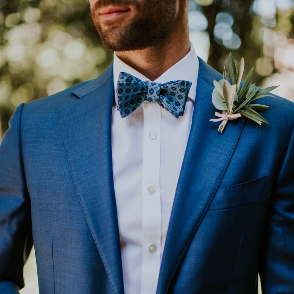 Groom in Light Blue Suit Supply Suit & Bow Tie | D&A Photography | Ben Walton Films