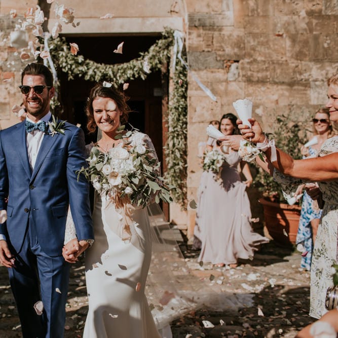 Confetti Exit | Bride in Morgan Davies Gown | Groom in Suit Supply | D&A Photography | Ben Walton Films
