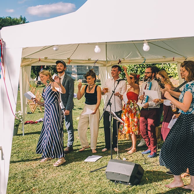 Outdoor Summer Wedding With Bright Colour Scheme With Colourful Homemade Decor And Images From Story + Colour Photography