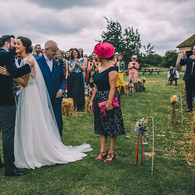 Outdoor Summer Wedding With Bright Colour Scheme With Colourful Homemade Decor And Images From Story + Colour Photography