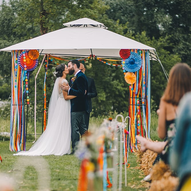 Outdoor Summer Wedding With Bright Colour Scheme With Colourful Homemade Decor And Images From Story + Colour Photography