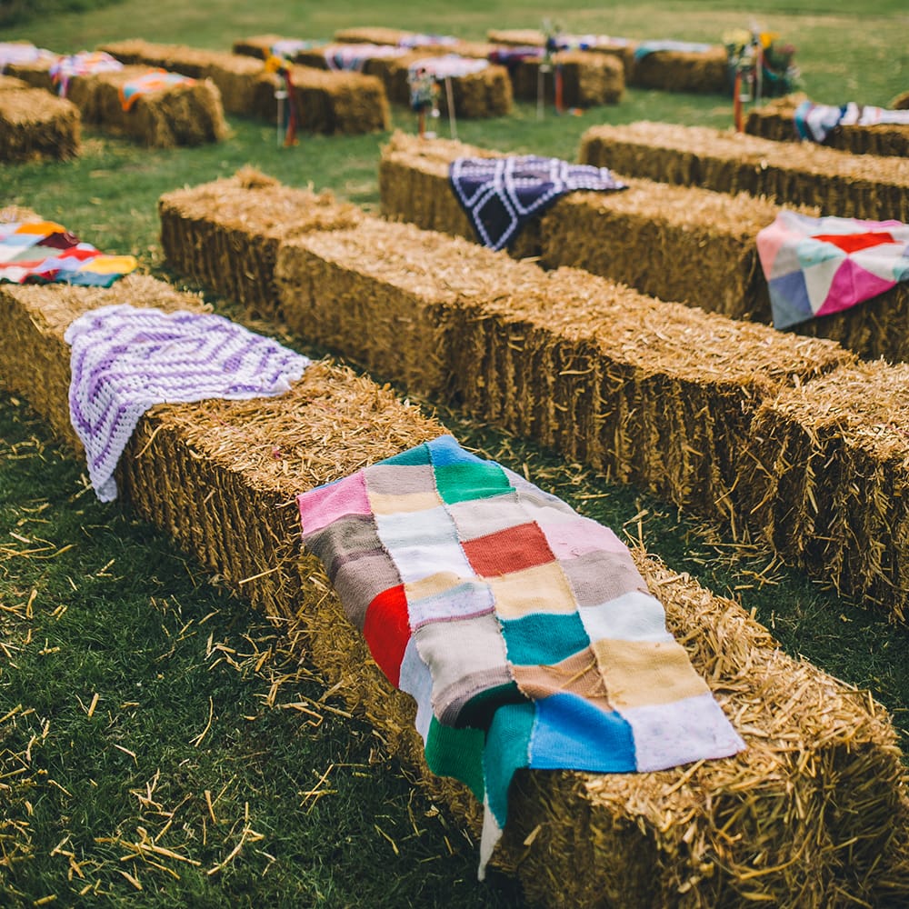 Haybale Seating For Outdoor Summer Wedding // Image By Story + Colour