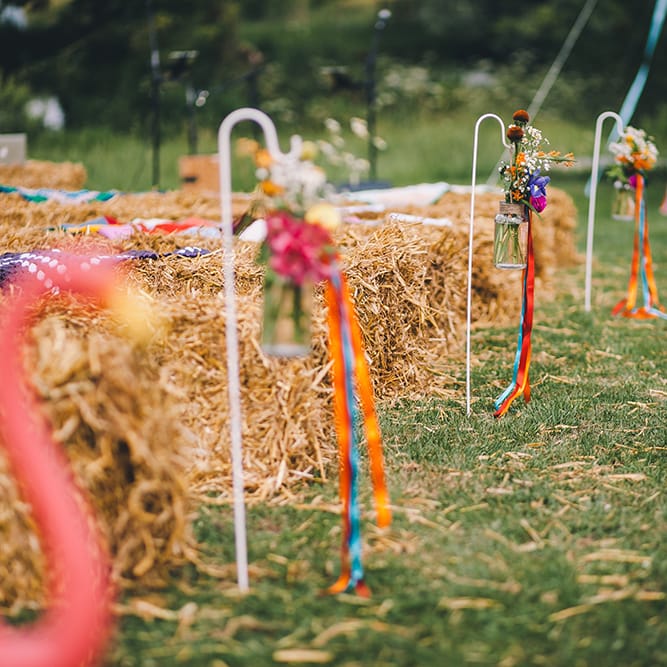 Haybale Seating For Outdoor Summer Wedding // Image By Story + Colour