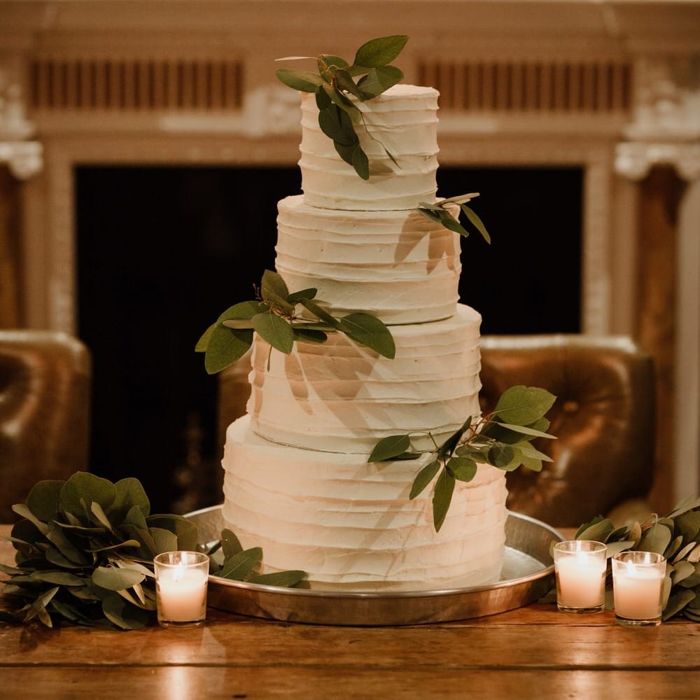 Buttercream Wedding Cake With Foliage Image By The Curries