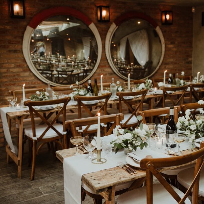 Wooden Trestle Tables With Soft Grey Runners, Taper Candles And White Florals For Wedding Image By The Curries
