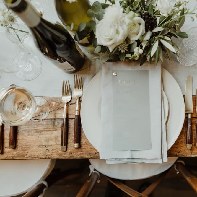 Wooden Trestle Tables With Soft Grey Runners, Taper Candles And White Florals For Wedding Image By The Curries