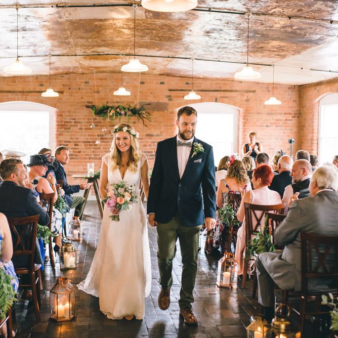 Bride in Bespoke Mariée Wedding Dress & Groom in Slater Jacket & Topman Chino's by Matt Brown Photography
