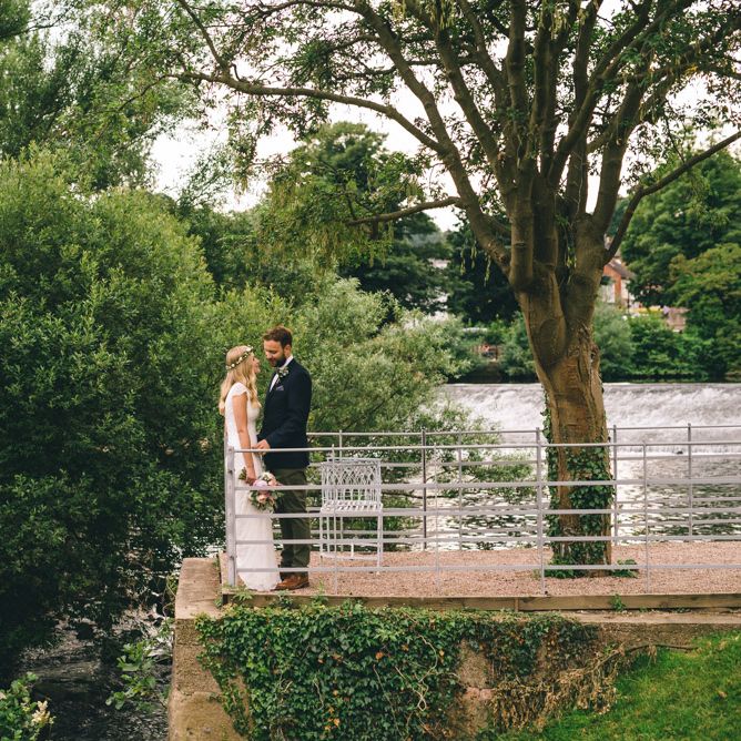 Bride in Bespoke Mariée Wedding Dress & Groom in Slater Jacket & Topman Chino's by Matt Brown Photography