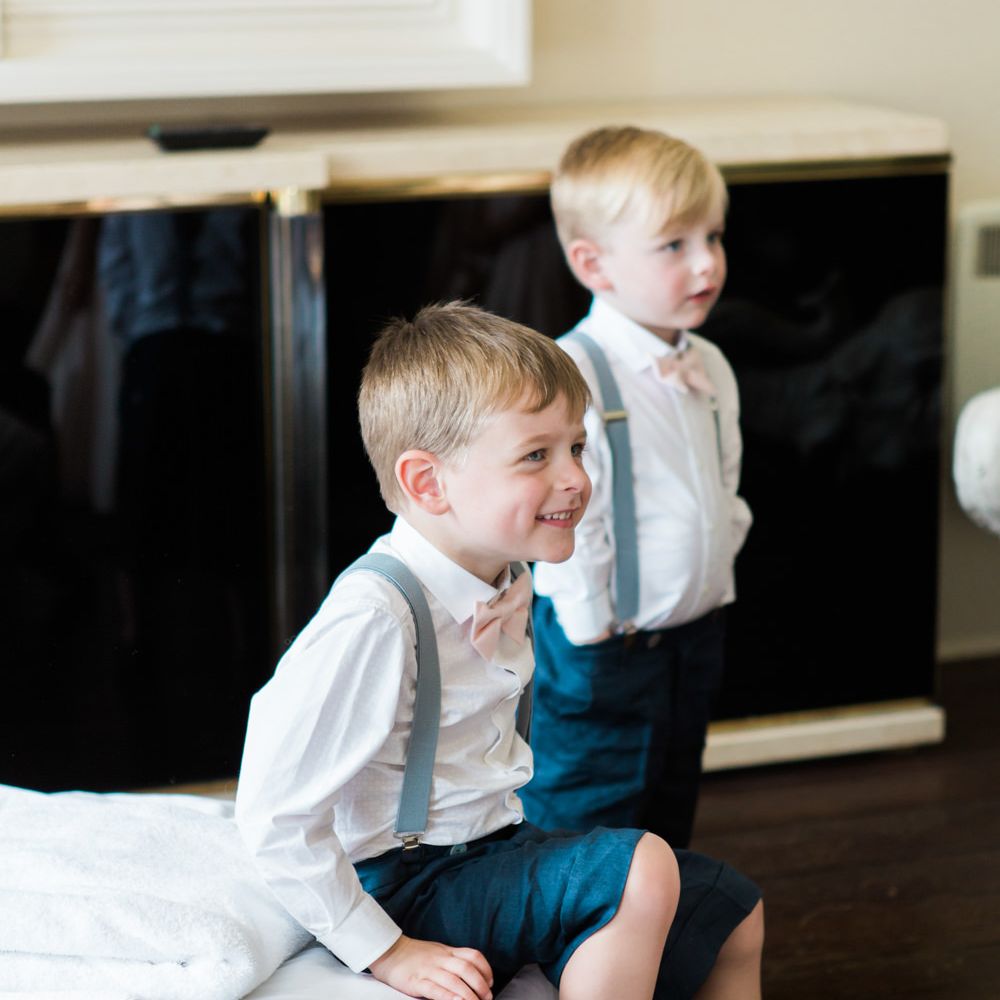 Page Boys in Shorts, Braces & Bow Ties | Elegant Blush Pink & White Wedding at Aynhoe Park in Oxfordshire | Lucy Davenport Photography
