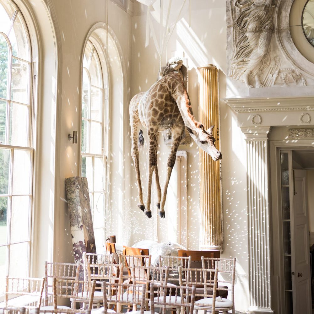 Hanging Giraffe | Elegant Blush Pink & White Wedding at Aynhoe Park in Oxfordshire | Lucy Davenport Photography